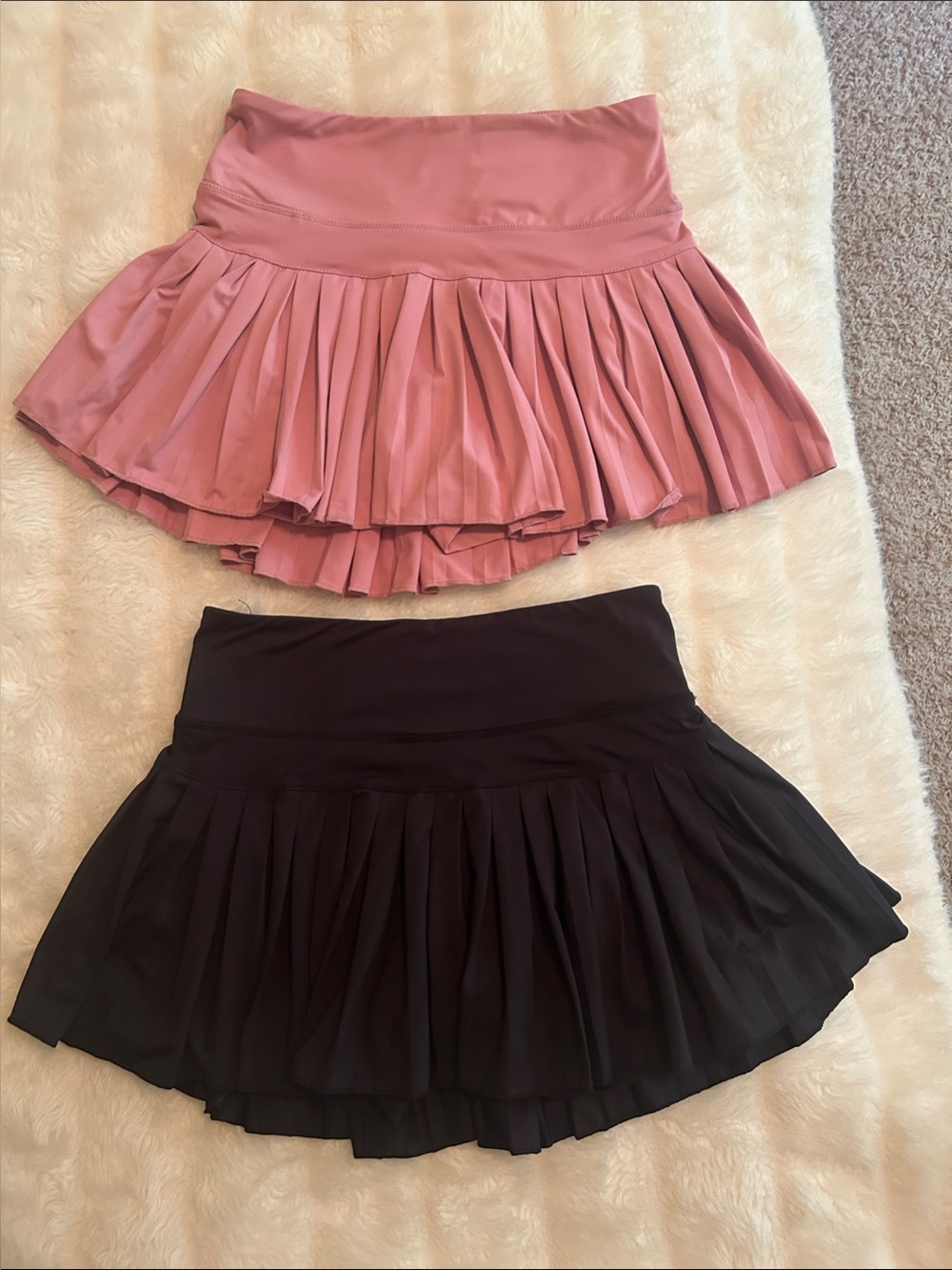 Pair of Women's Goldhinge Pleated Active Skirts - Dusty Pink and Black
